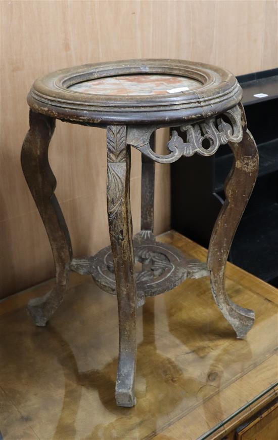 A Chinese marble topped jardiniere stand 35cm diameter